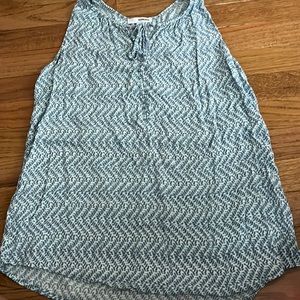 This top is flowy and perfect for summer! It is size small and from Sonoma.